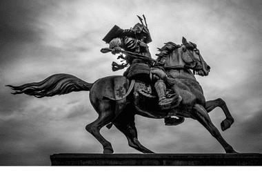 Image of a statue that represents Japan's long history of legendary Samurai
